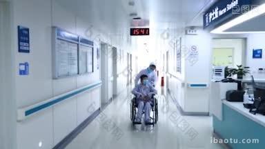 4K医疗_ <strong>护士</strong>推着<strong>患者</strong>在病房走廊